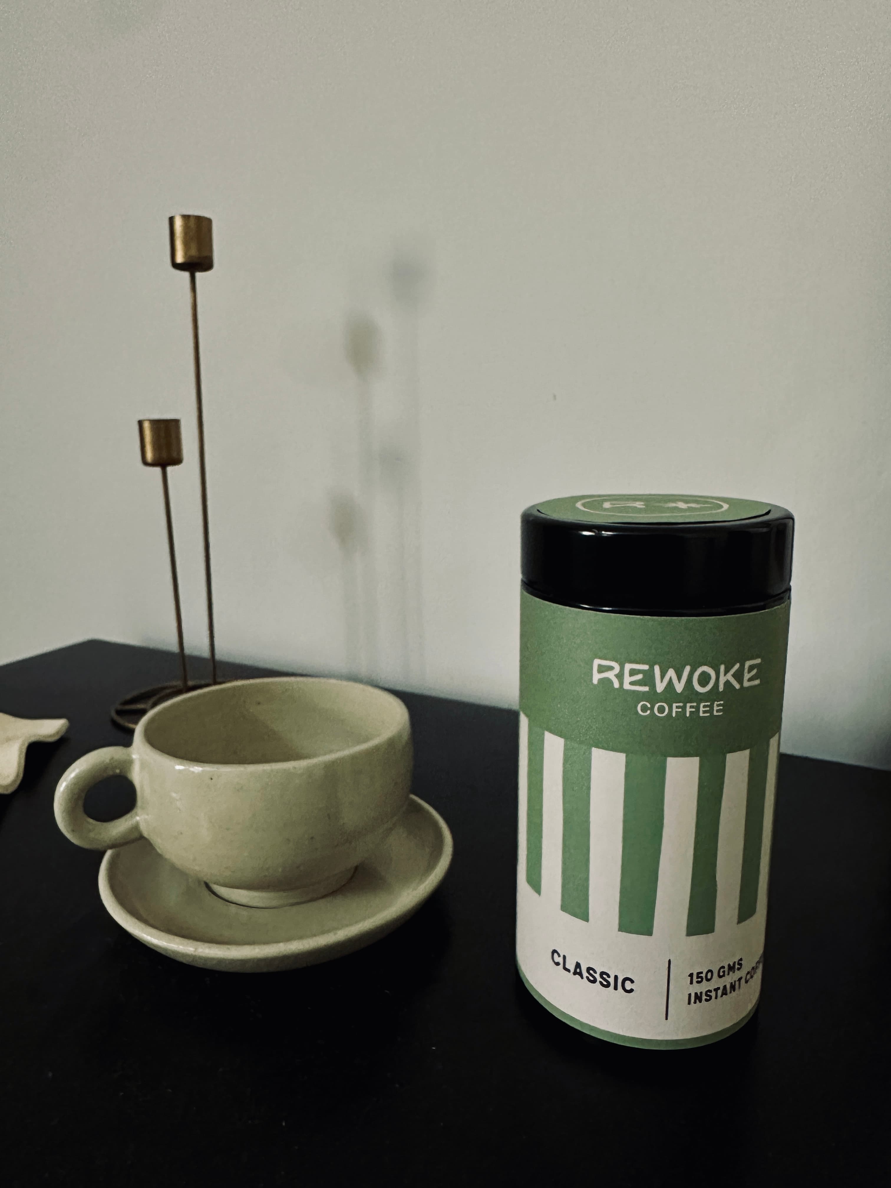 Rewoke Classic tin with a cup of coffee